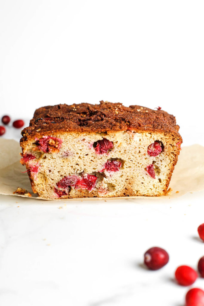 Cranberry orange bread loaf with fresh cranberries
