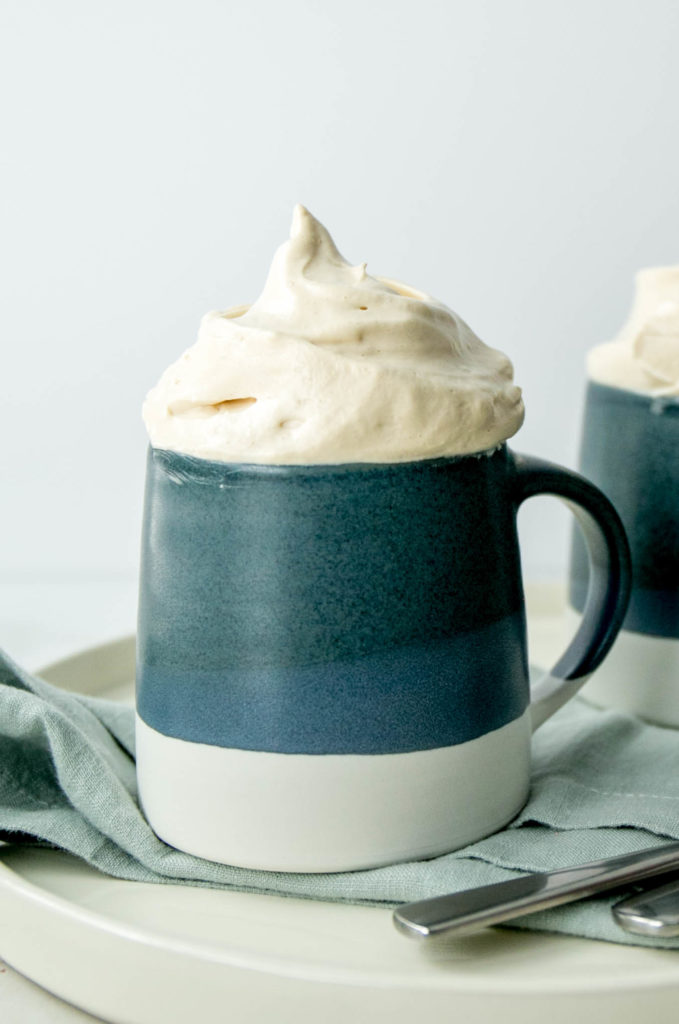 A mug of hot chocolate with marshmallow fluff