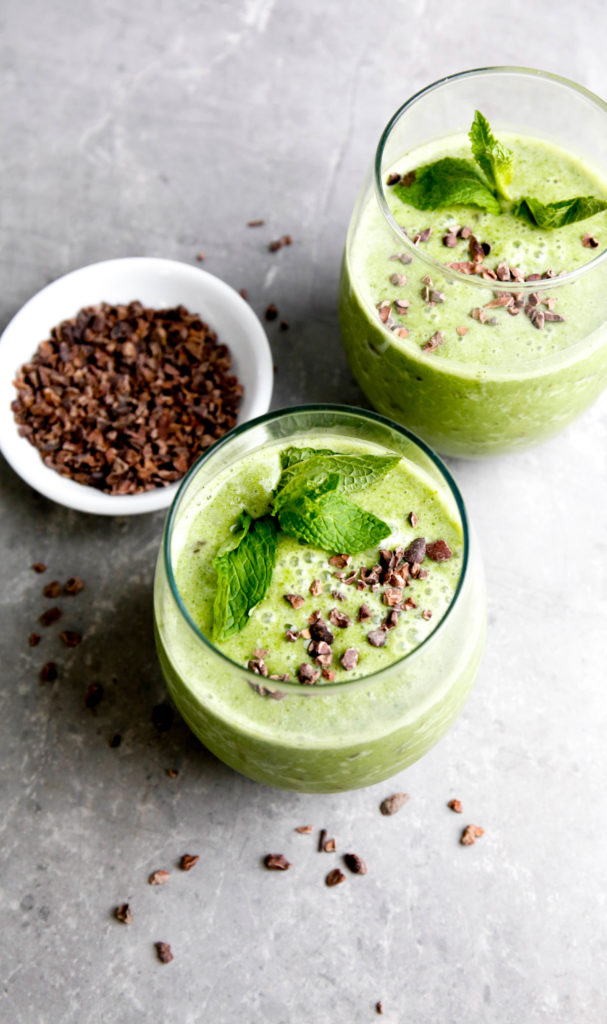two mint smoothies with cacao nibs