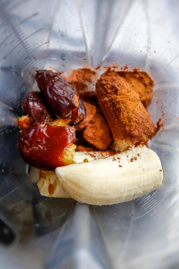 dates, banana, cacao powder and coffee in a blender