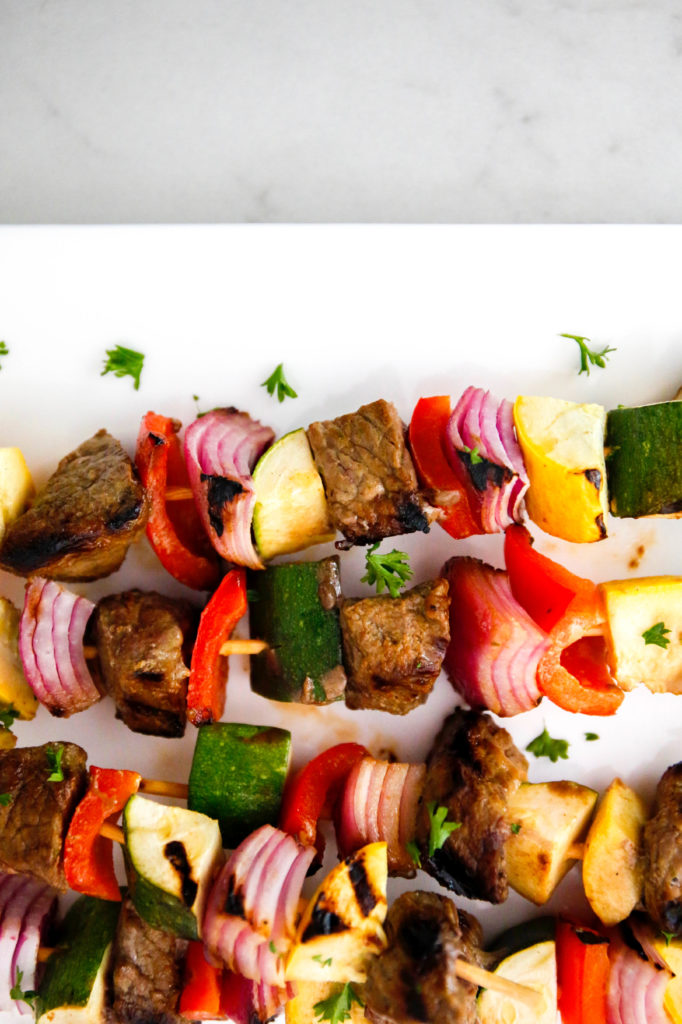 beef skewers unclose with zucchini, bell pepper, summer squash and red onion