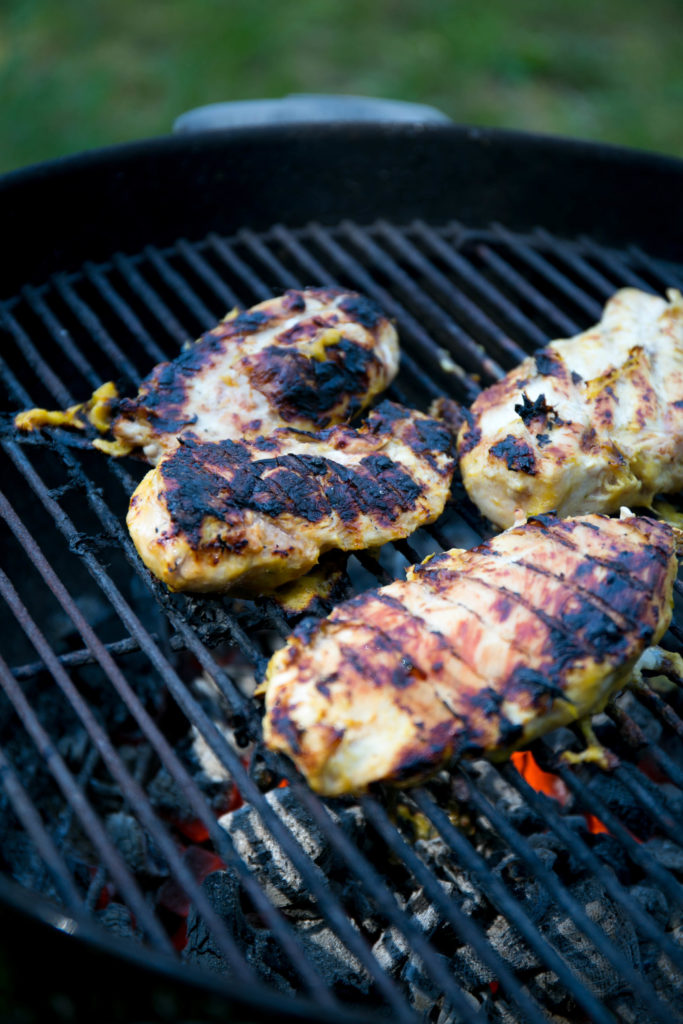 chicken breasts being grilled