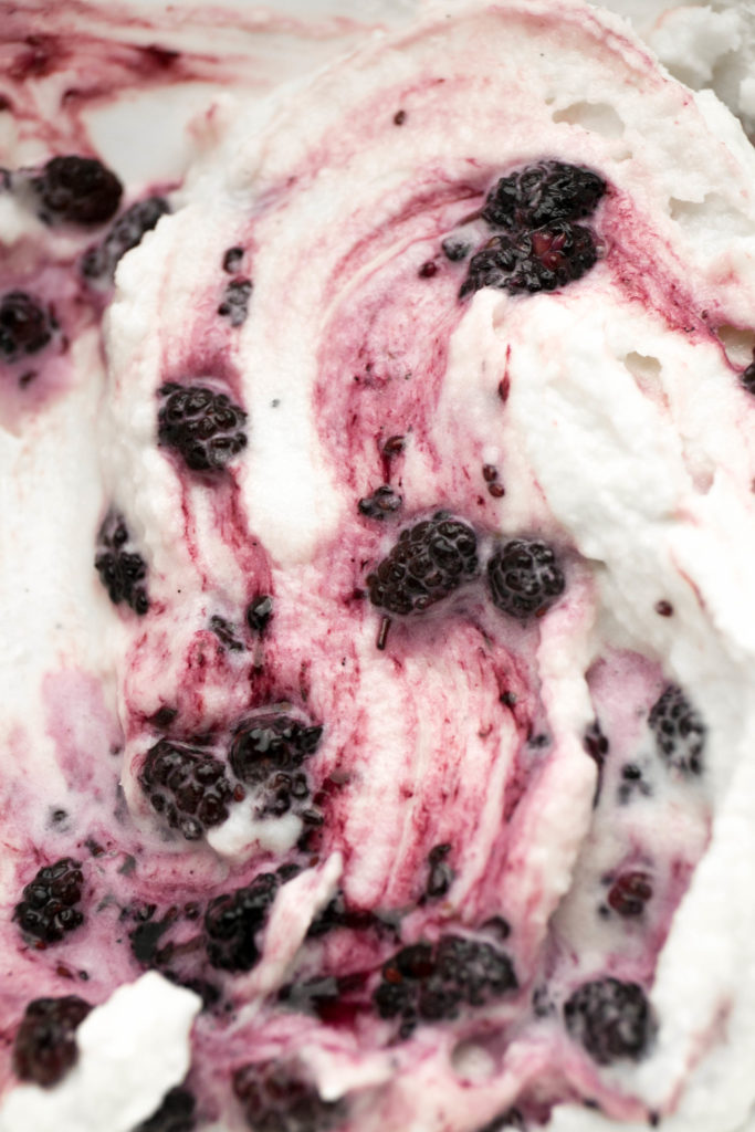 mulberry ice cream swirls with vanilla ice cream