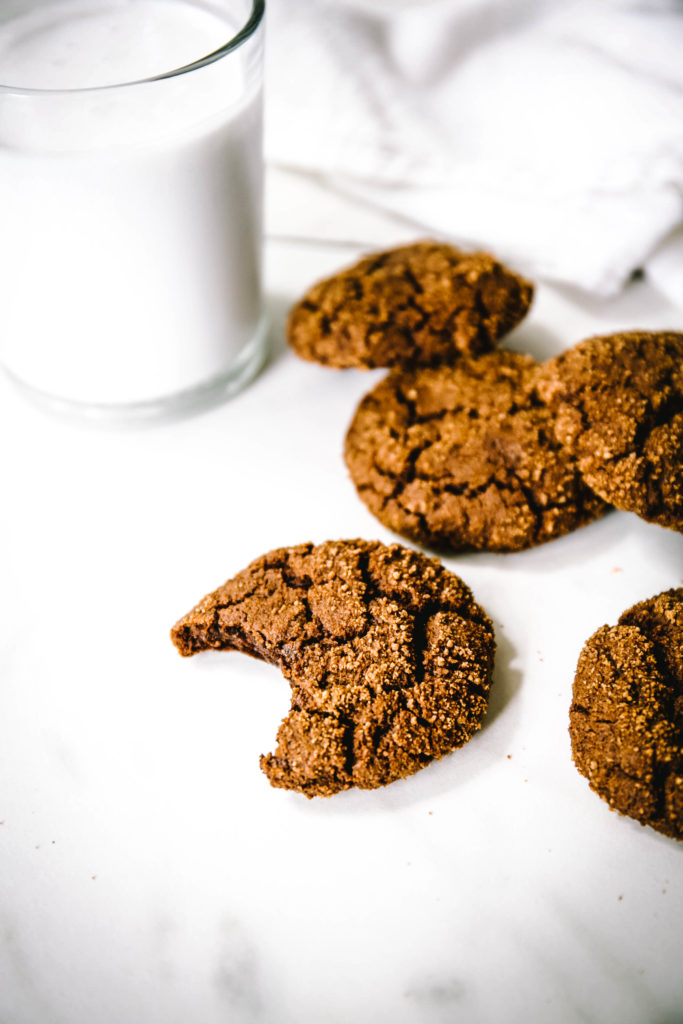 Molasses cookies with a glass of coconut milk