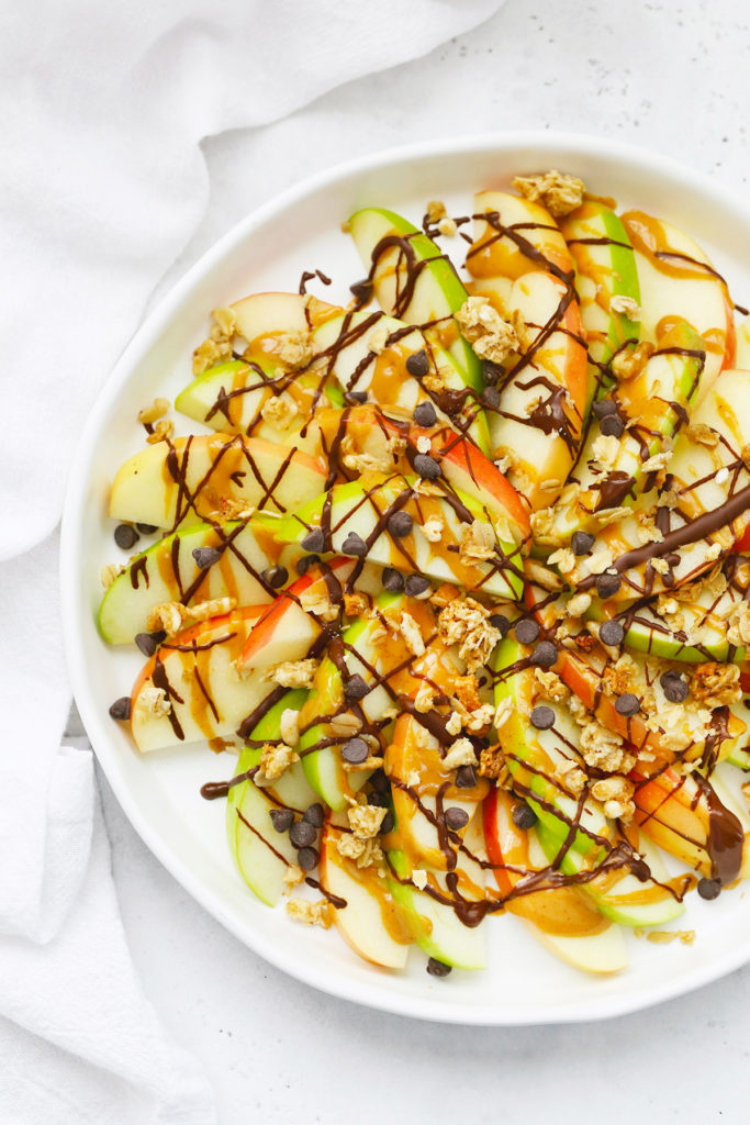 Apple Nachos from One Lovely Life with a drizzle of caramel, chocolate and walnuts