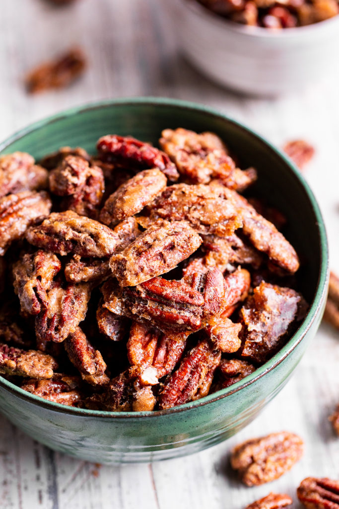 Maple Cinnamon Candied Pecans from Paleo Running Momma in a green bowl