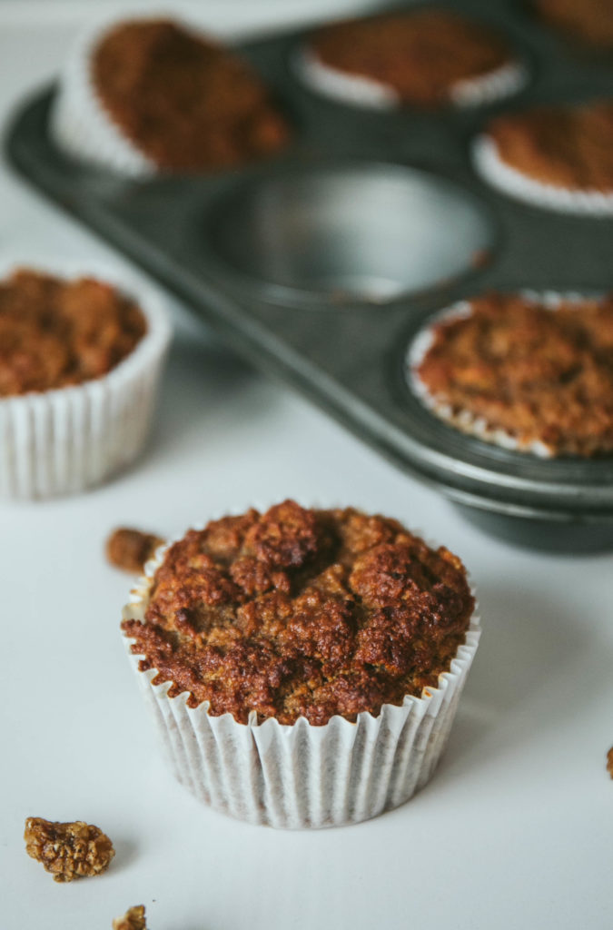 Up close photo of a white mulberry muffins with dried white mulberries