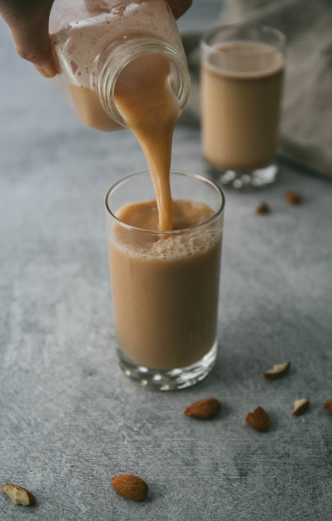 2-minute almond milk being poured into a glass