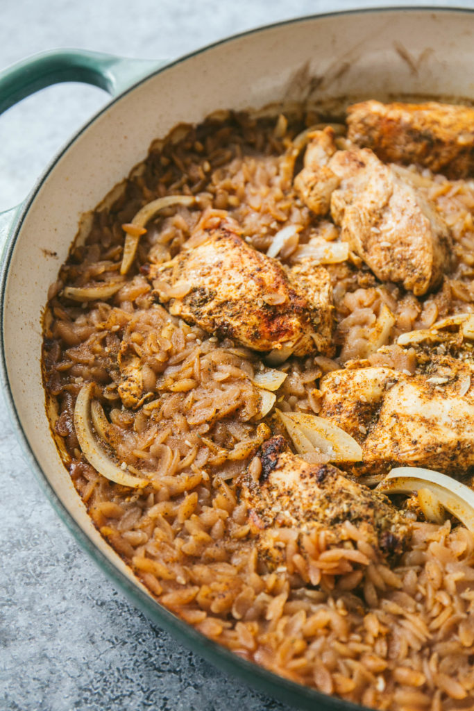 Series of Za'atar chicken with grain-free orzo being cooked in a skillet