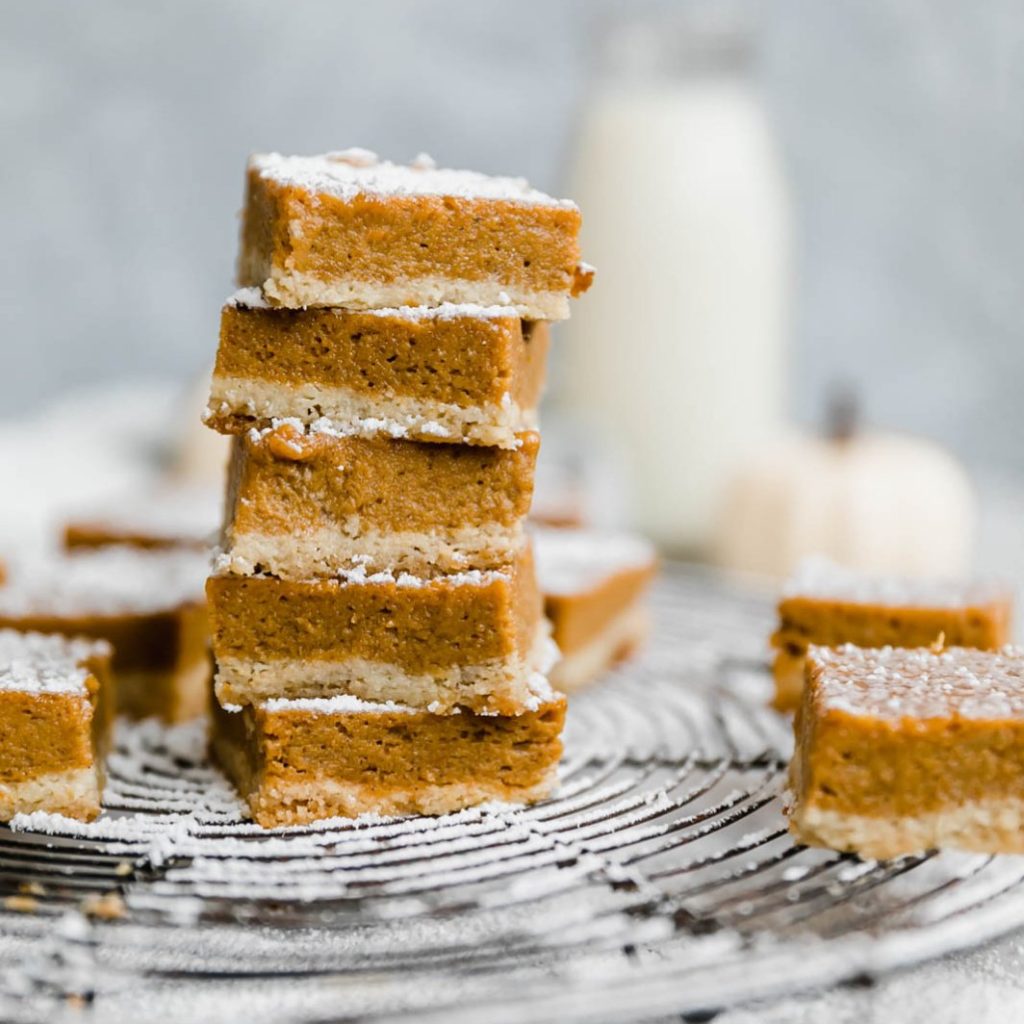Paleo pumpkin bars stacked on top of each other 