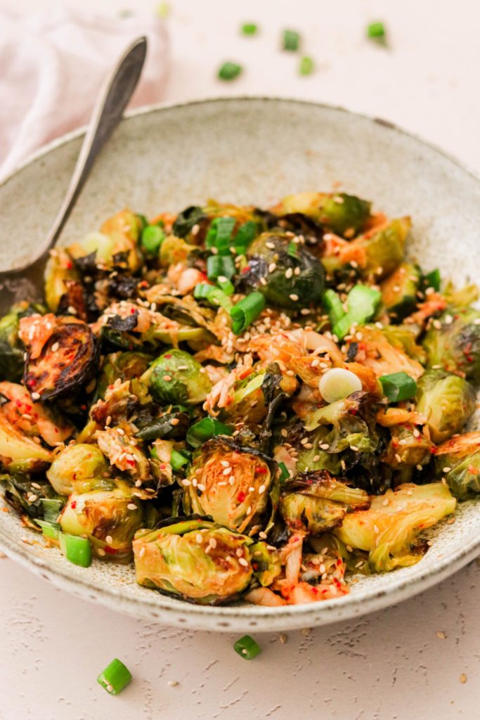 Kimchi brussels sprouts in a serving bowl
