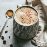 Maple tahini latte with coffee beans and tahini