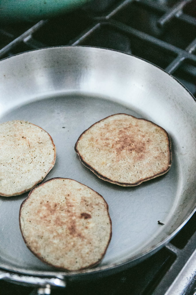 Protein pancakes in a pan cooking