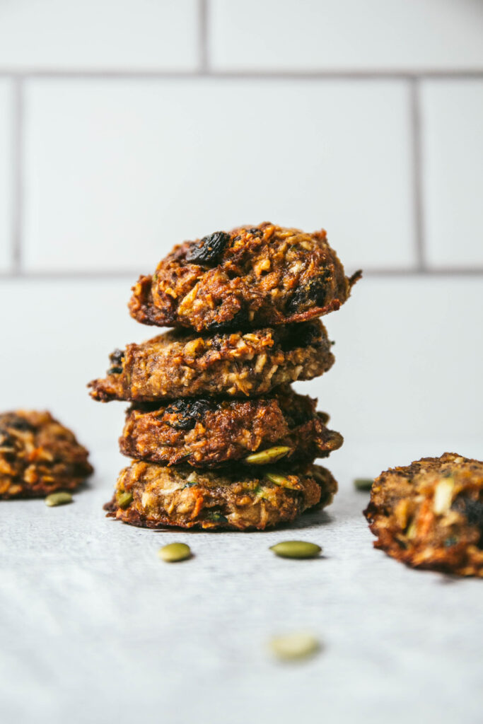 Four naturally sweetened breakfast cookies stacked on top of each other