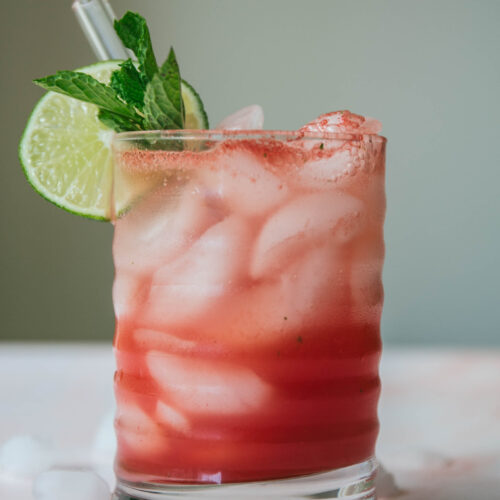 Watermelon mint mocktail with fresh mint and lime as garnish