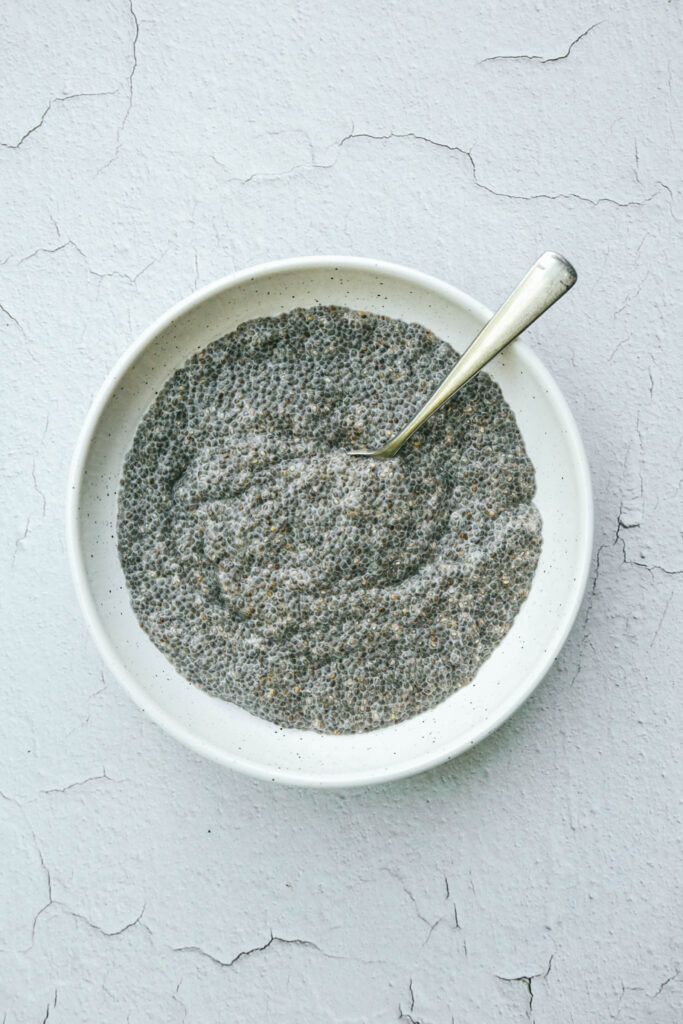 Aerial view of chia seed pudding in a white bowl