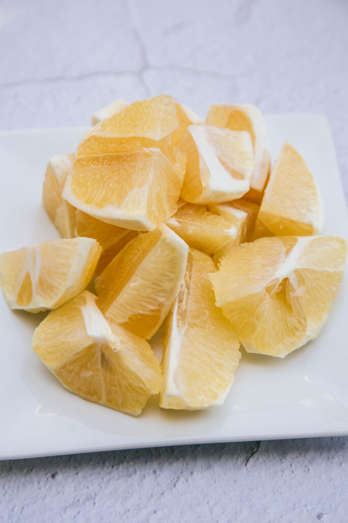 Chunks of fresh lemon on a plate